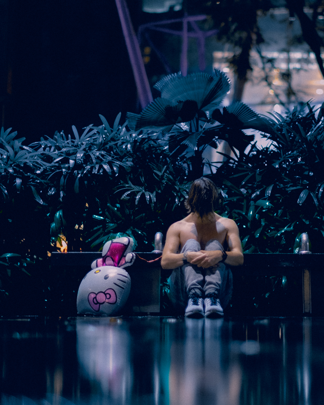 portrait of zaccy meditating in the rain